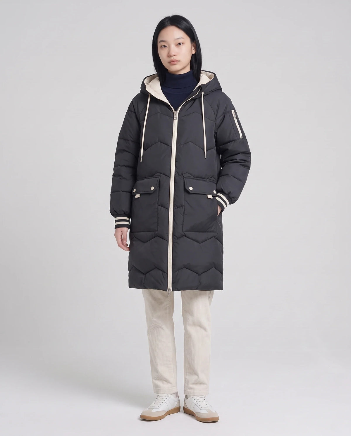 Doudoune longue oversize à chevrons et capuche