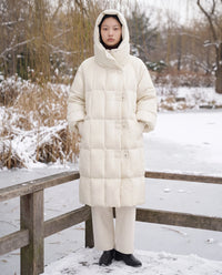 Doudoune longue oversize à col-capuche zippé