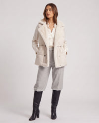 Gilet sans manches à col fausse fourrure