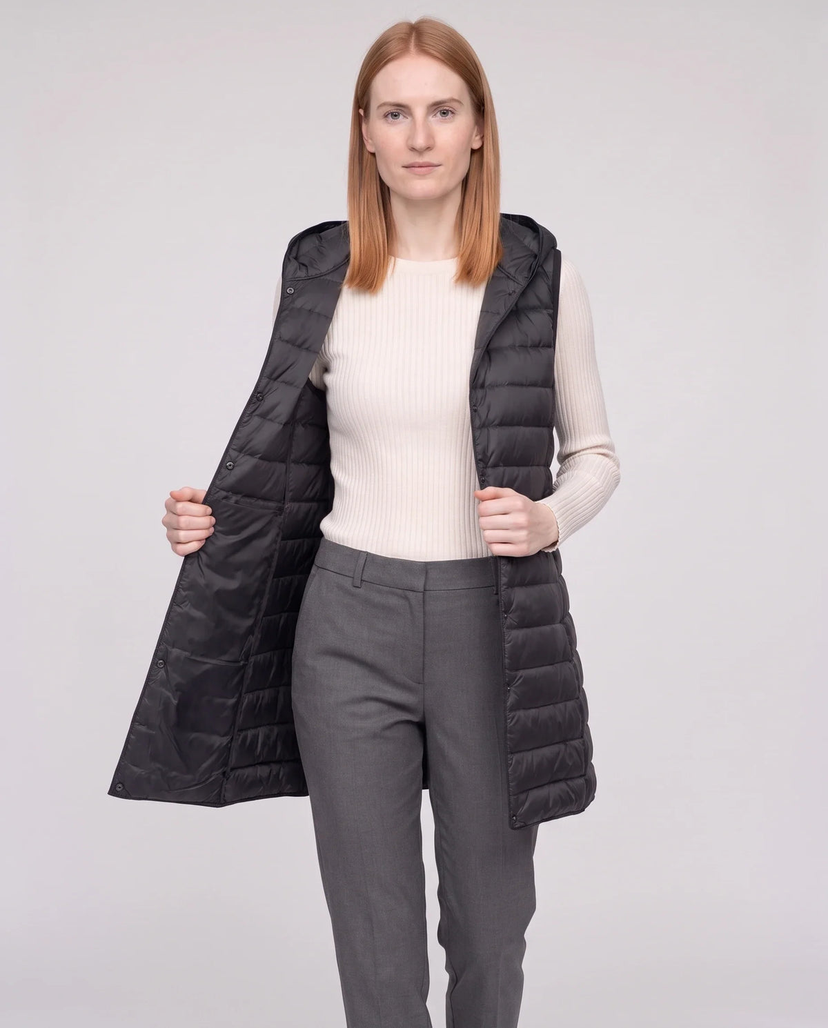 Gilet long sans manches matelassé à capuche