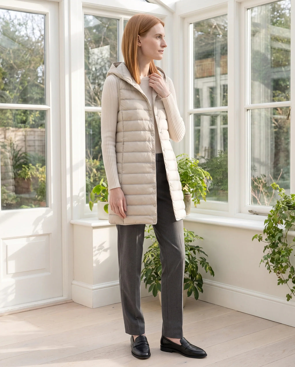 Gilet long sans manches matelassé à capuche