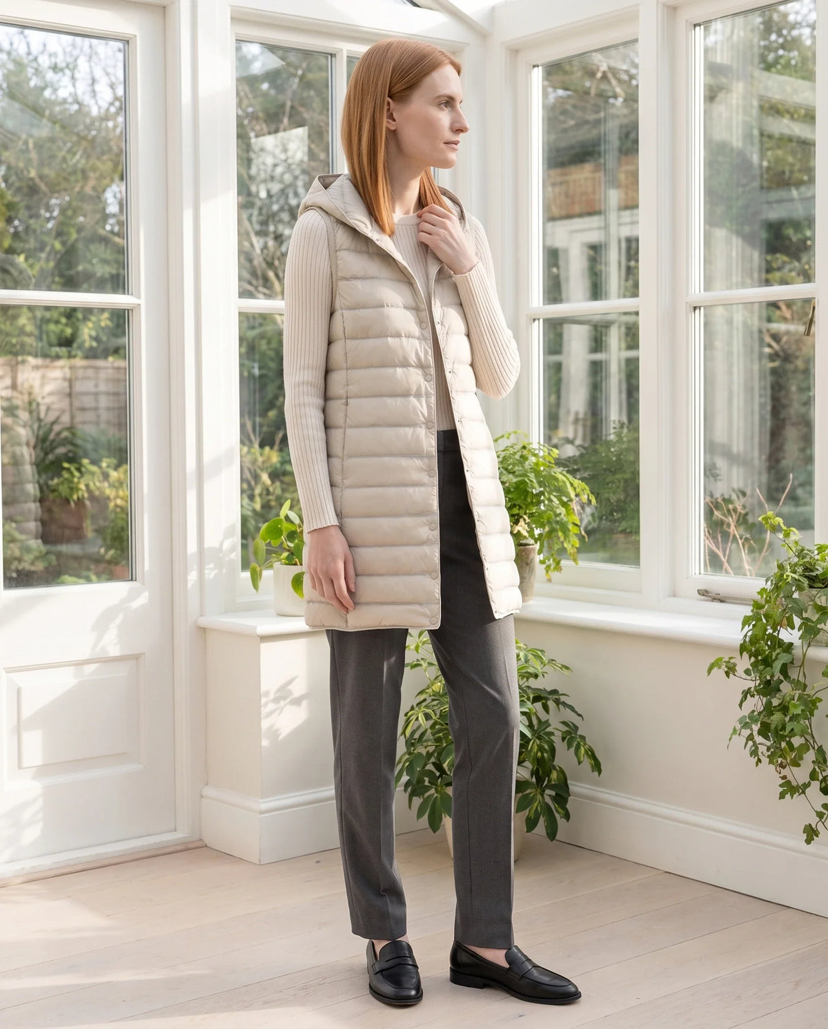 Gilet long sans manches matelassé à capuche