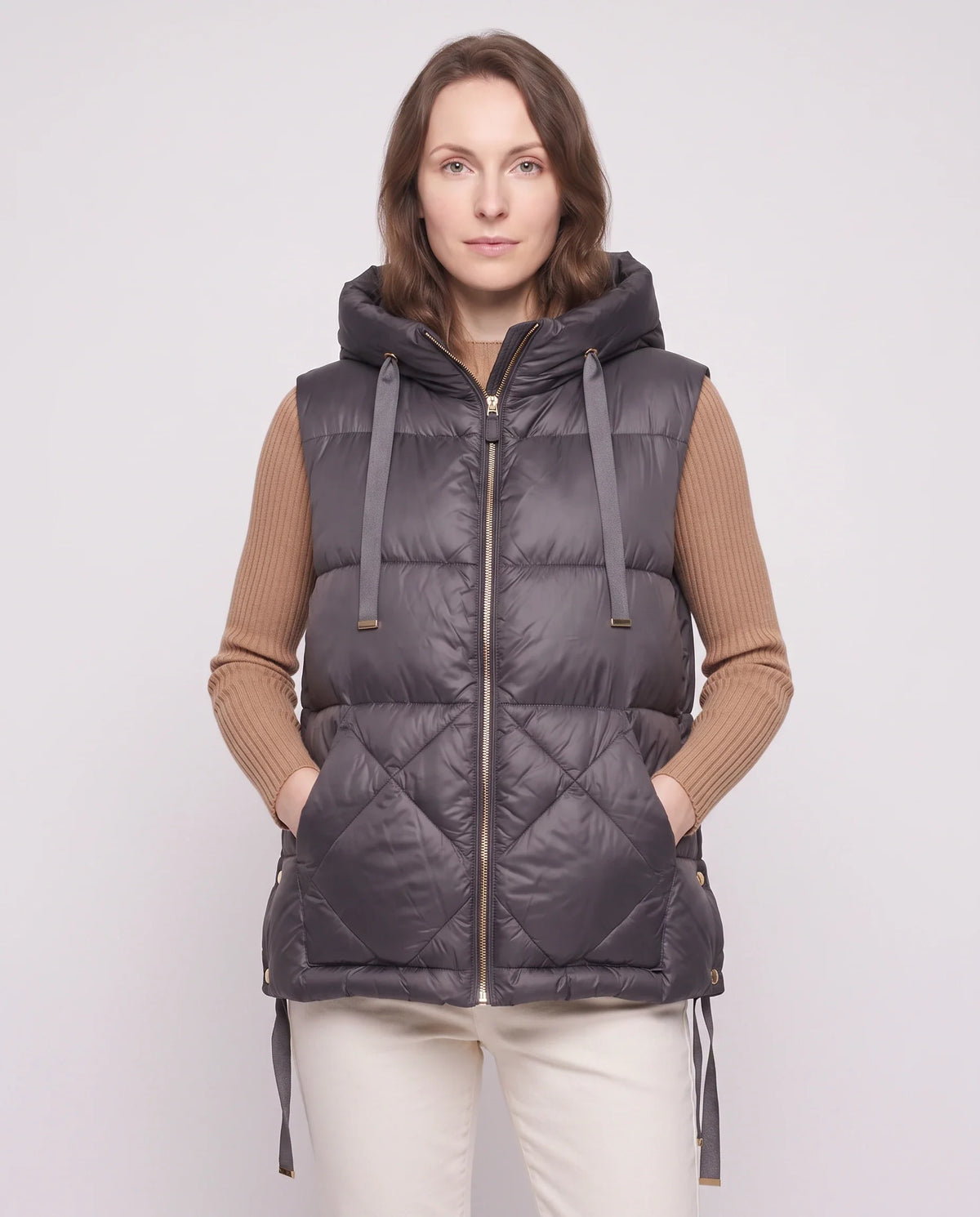 Gilet matelassé à capuche et grandes poches