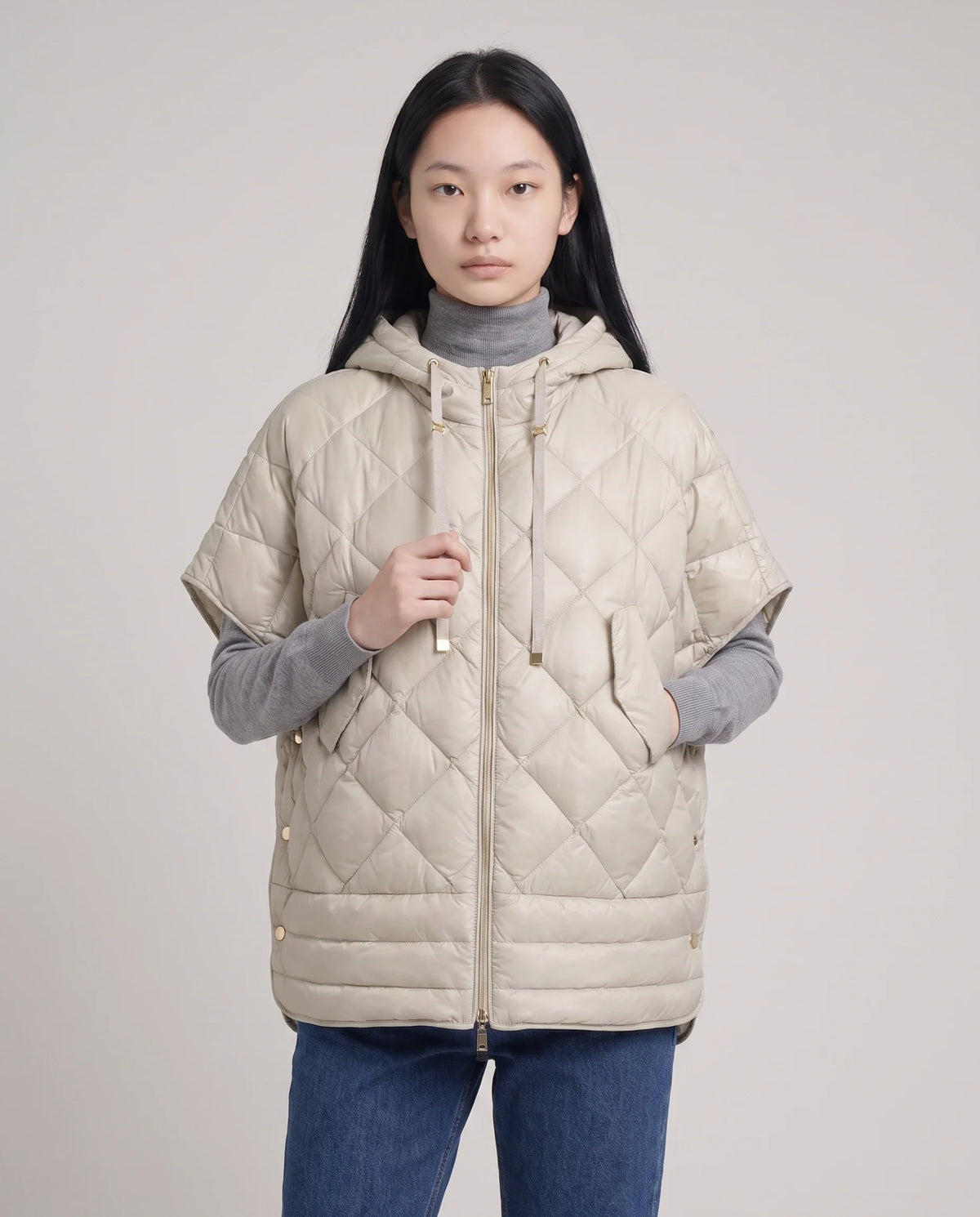 Gilet matelassé à capuche et pressions