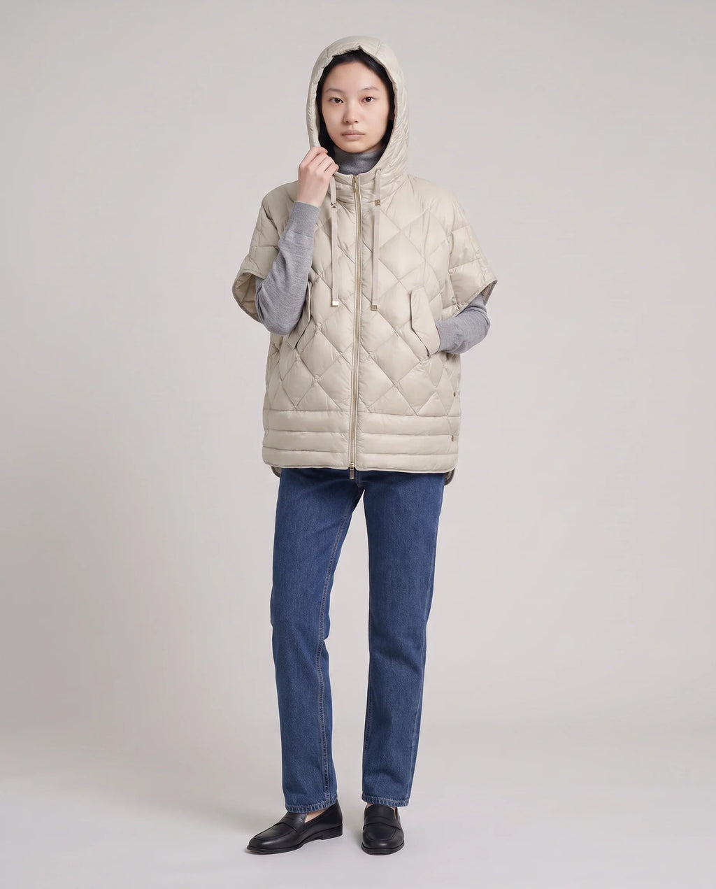 Gilet matelassé à capuche et pressions