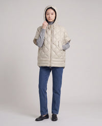 Gilet matelassé à capuche et pressions