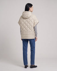 Gilet matelassé à capuche et pressions