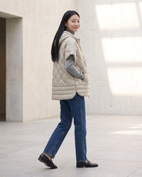 Gilet matelassé à capuche et pressions