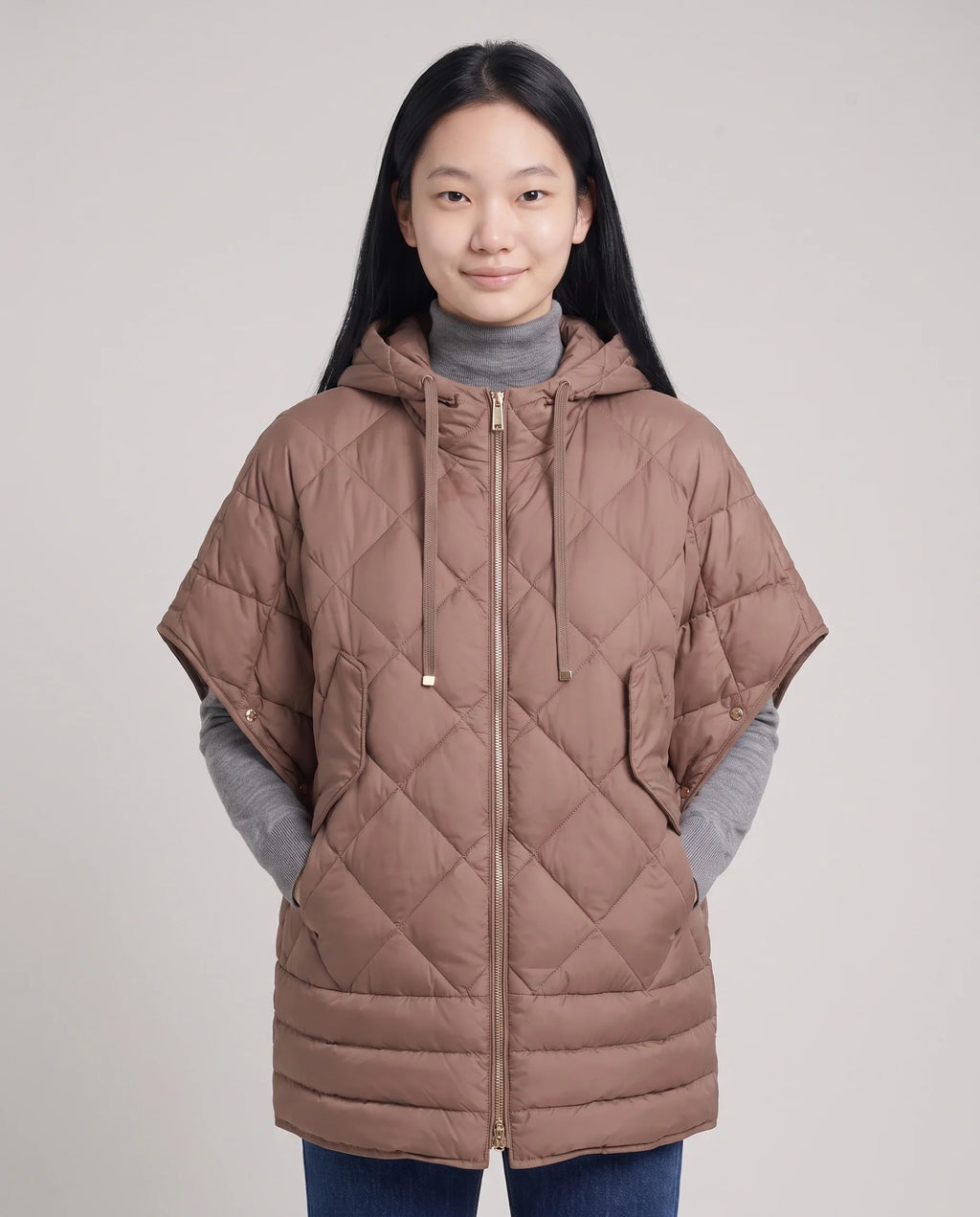 Gilet matelassé à capuche et pressions