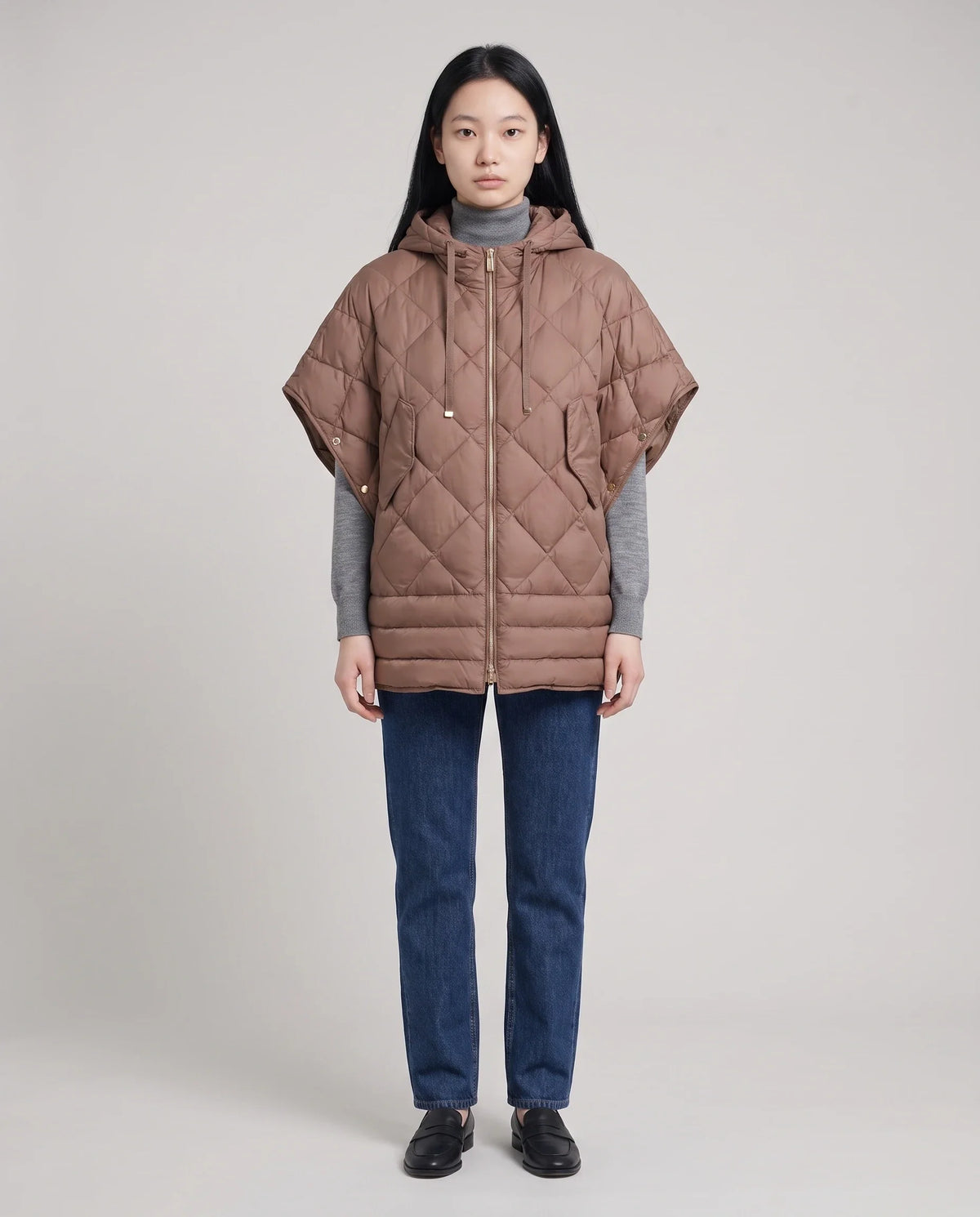 Gilet matelassé à capuche et pressions