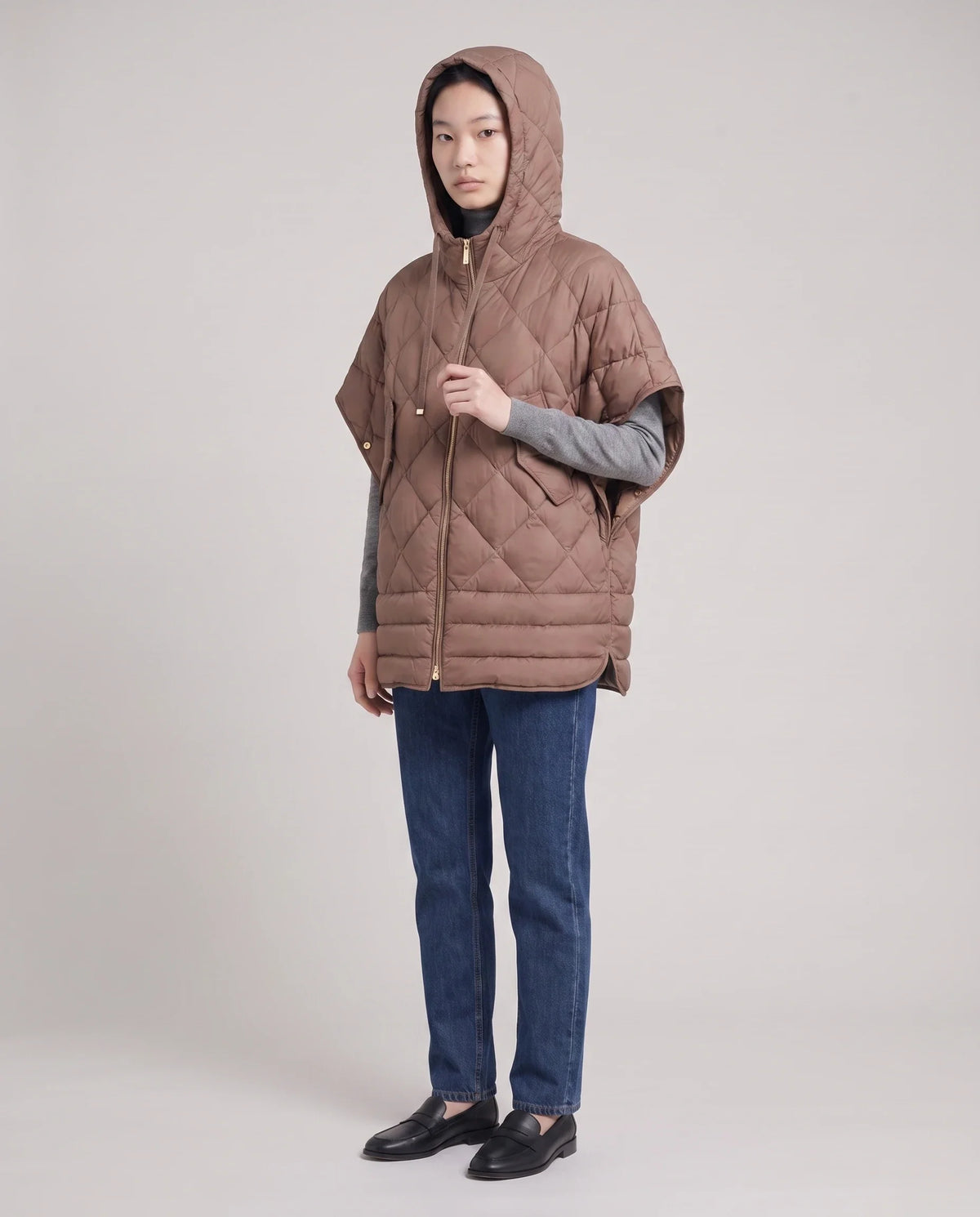 Gilet matelassé à capuche et pressions