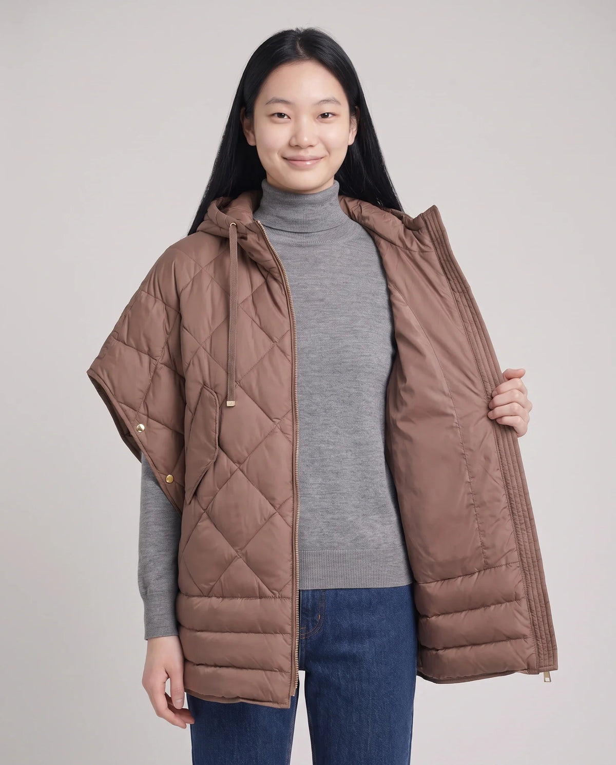 Gilet matelassé à capuche et pressions