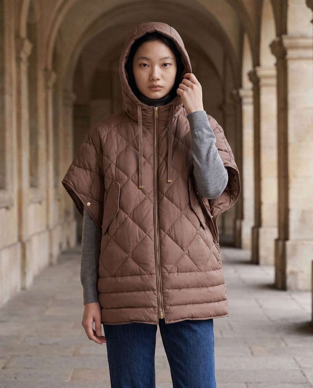 Gilet matelassé à capuche et pressions
