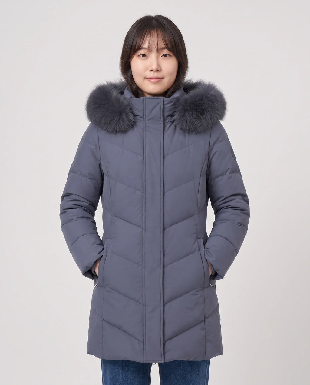 Parka longue cintrée à capuche fourrure