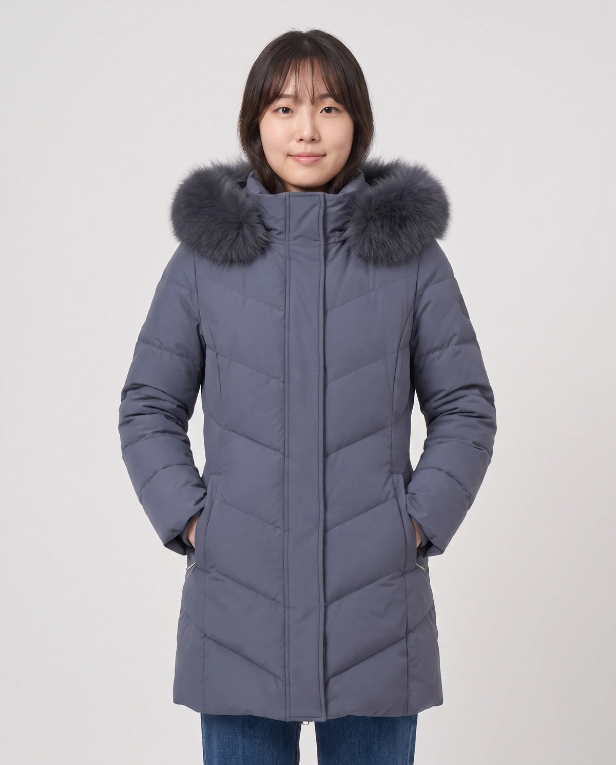 Parka longue cintrée à capuche fourrure