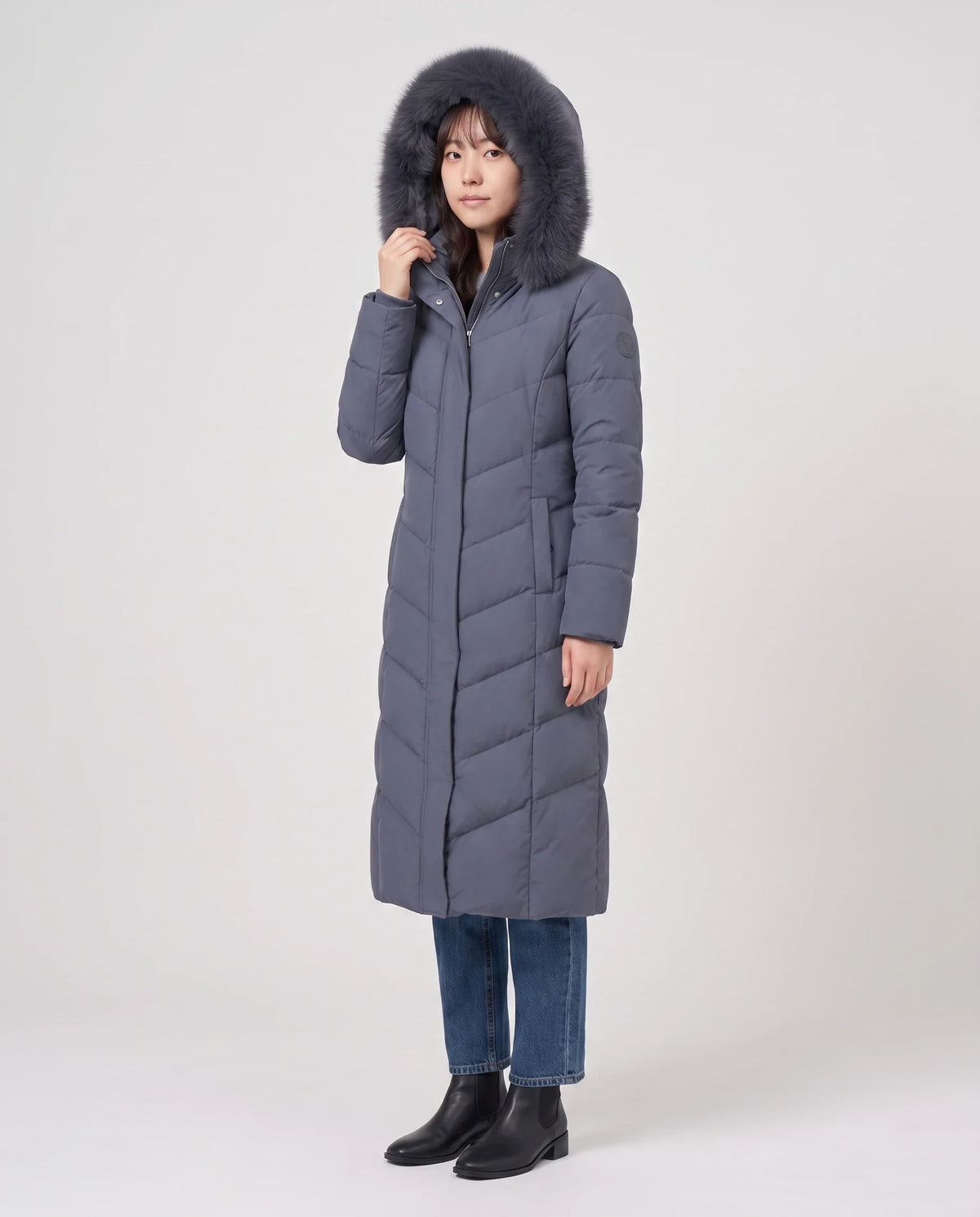Parka longue cintrée à capuche fourrure