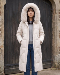 Parka longue cintrée à capuche fourrure