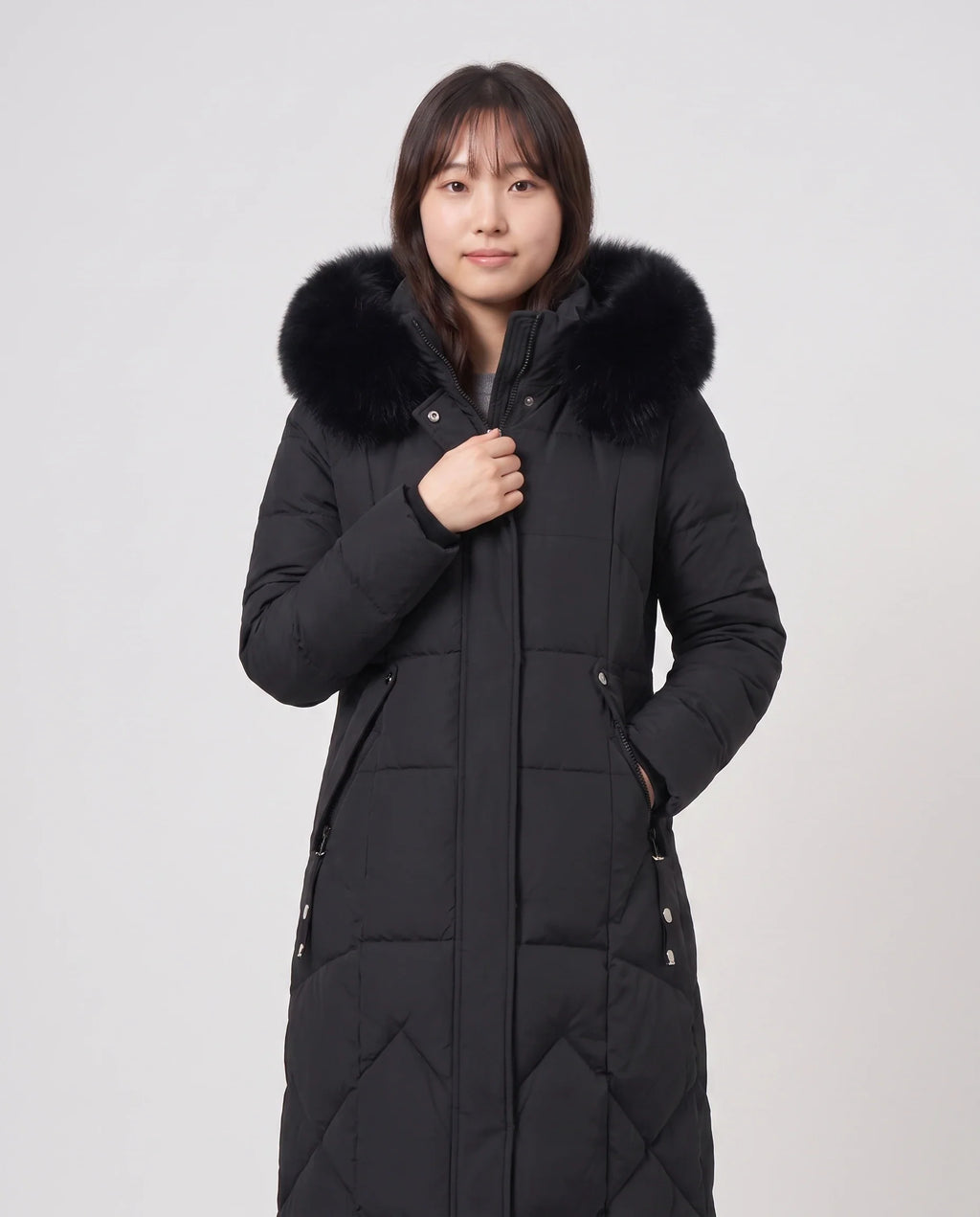 Parka longue cintrée à capuche fourrure
