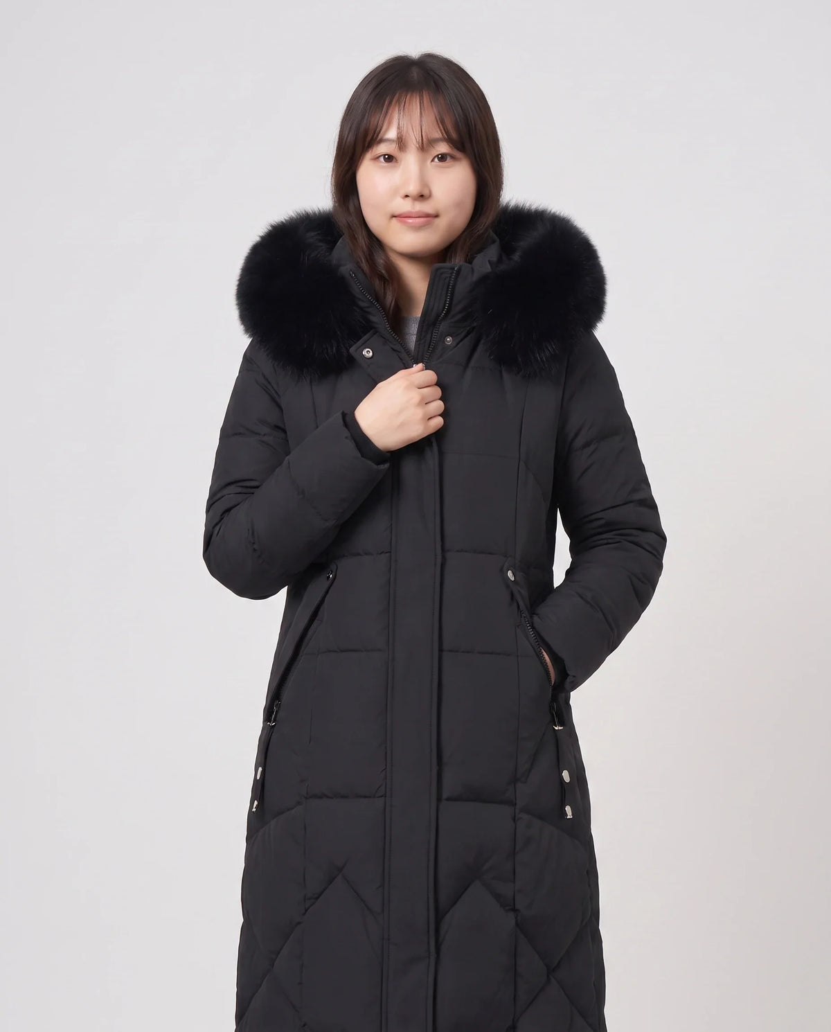 Parka longue cintrée à capuche fourrure
