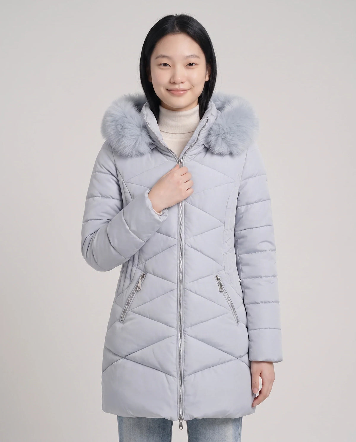 Parka mi-longue cintrée à capuche fourrure
