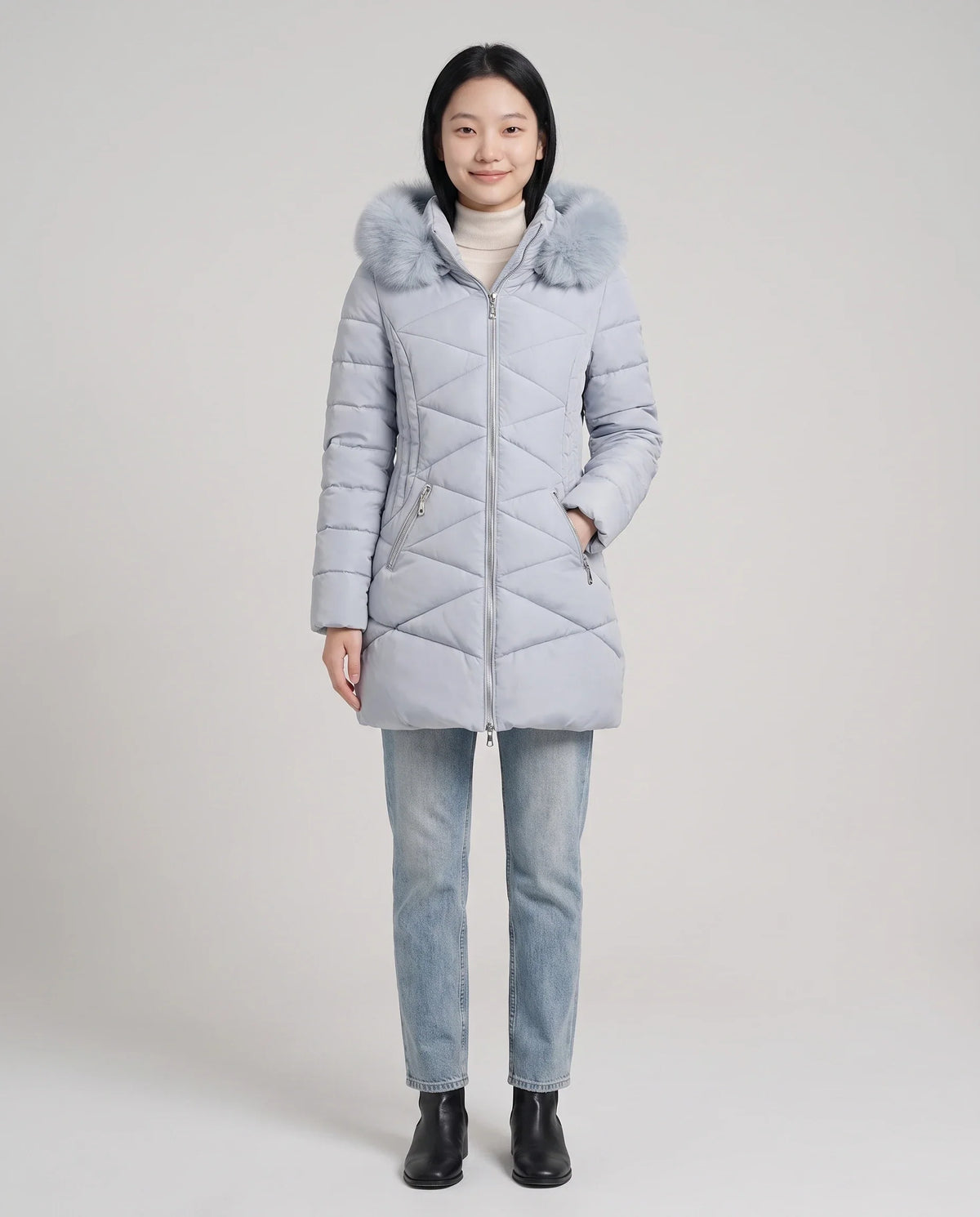 Parka mi-longue cintrée à capuche fourrure