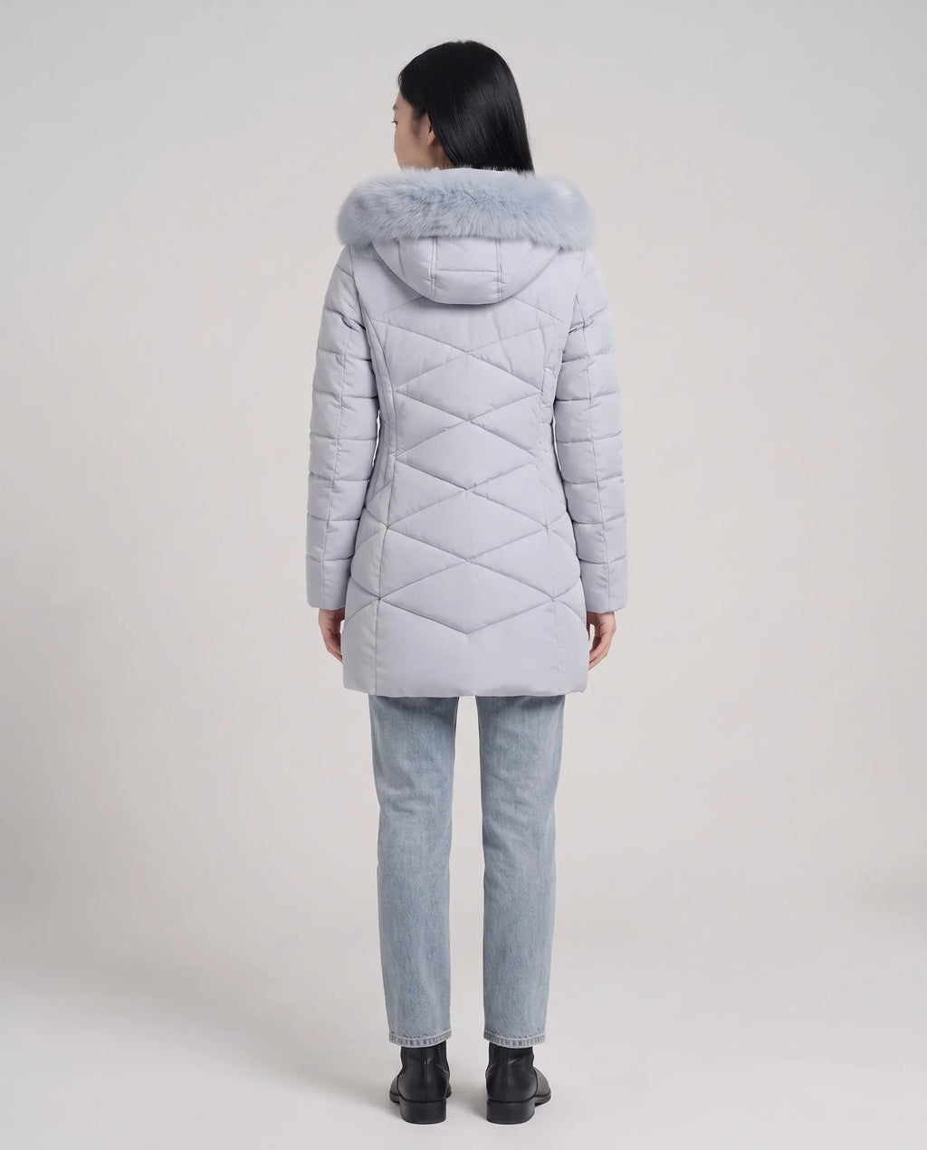 Parka mi-longue cintrée à capuche fourrure