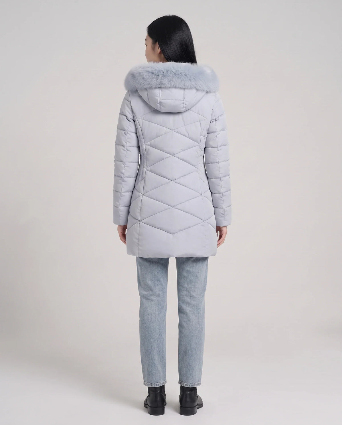 Parka mi-longue cintrée à capuche fourrure