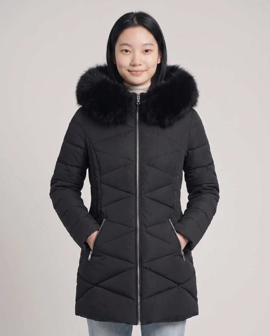 Parka mi-longue cintrée à capuche fourrure