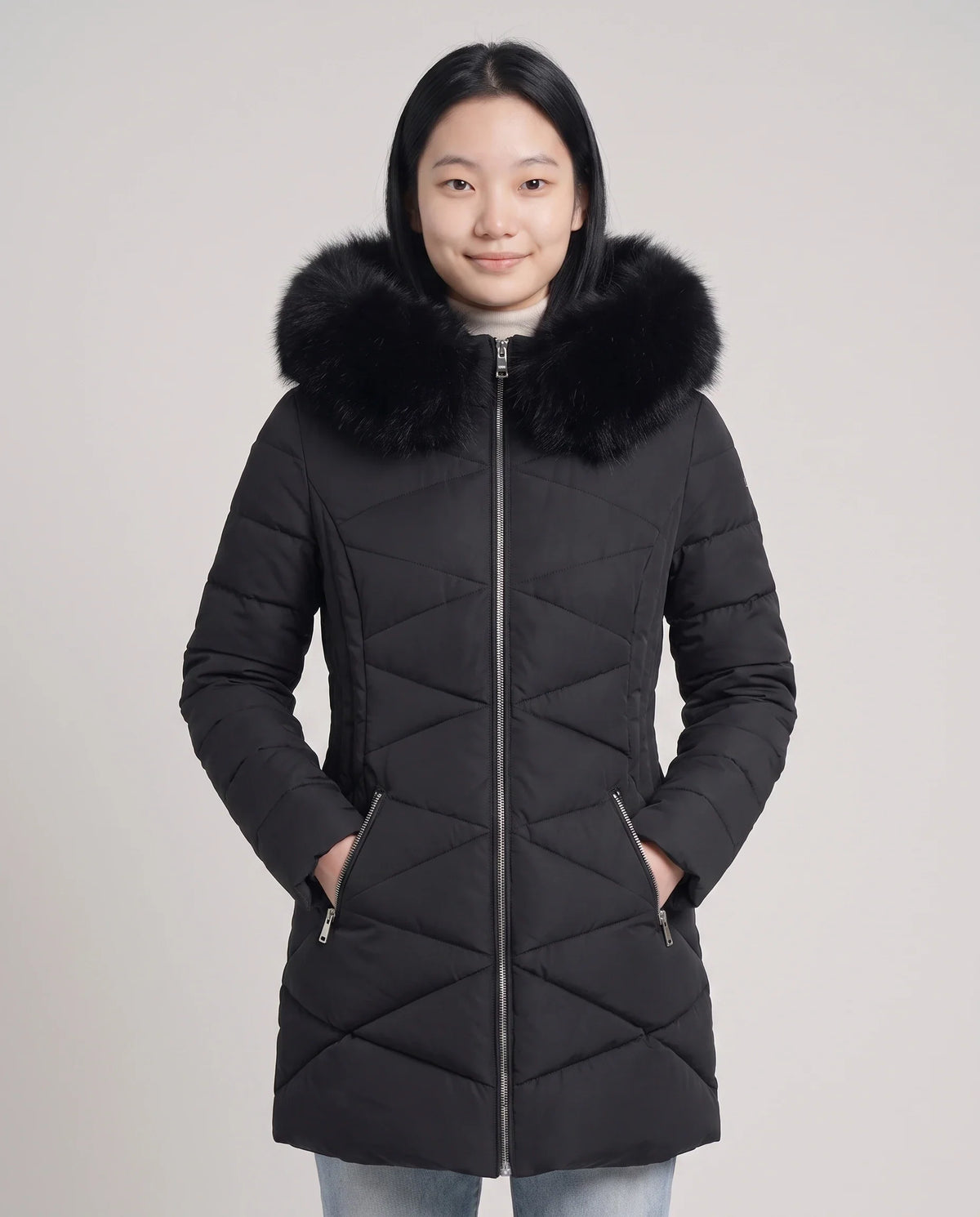 Parka mi-longue cintrée à capuche fourrure