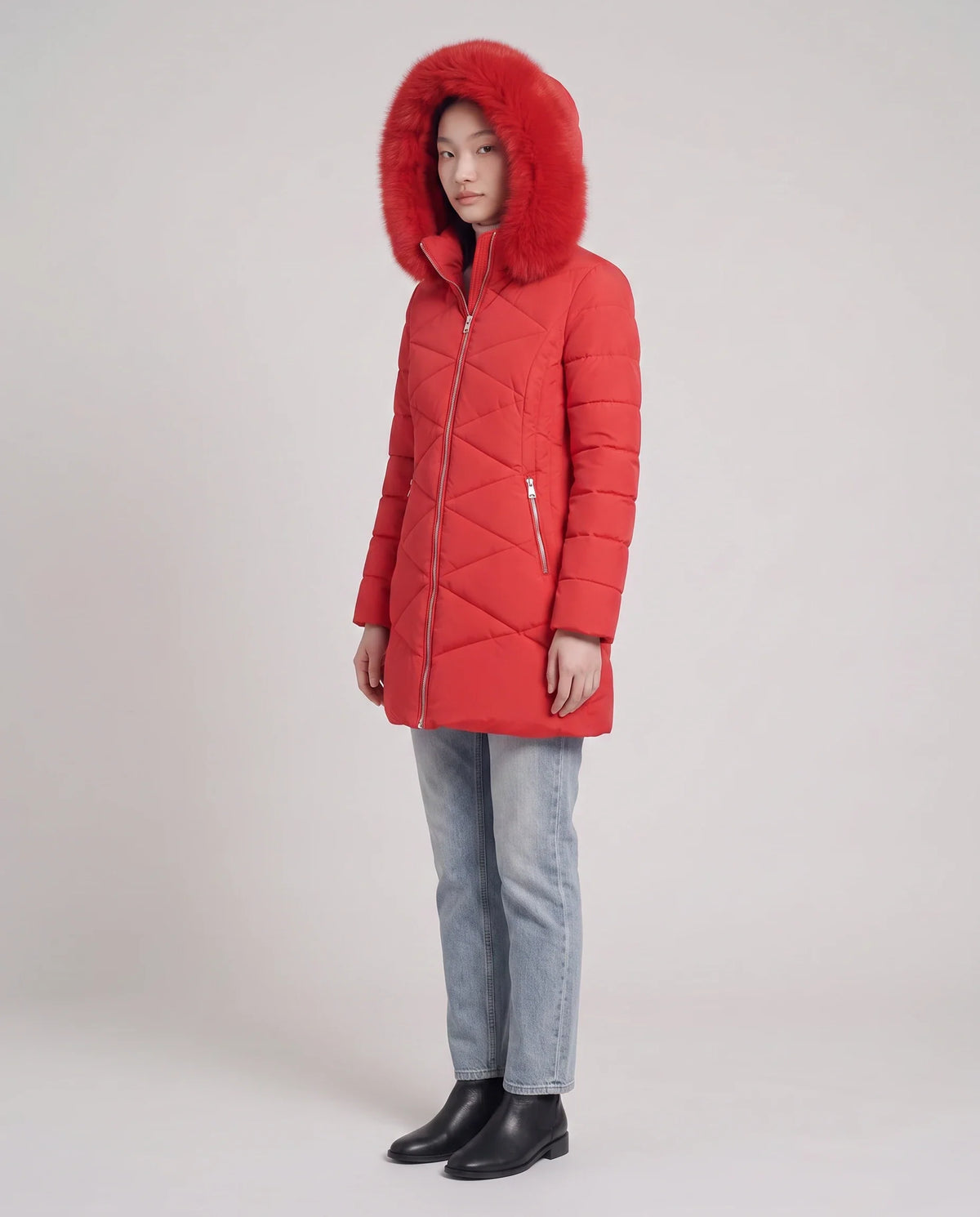 Parka mi-longue cintrée à capuche fourrure