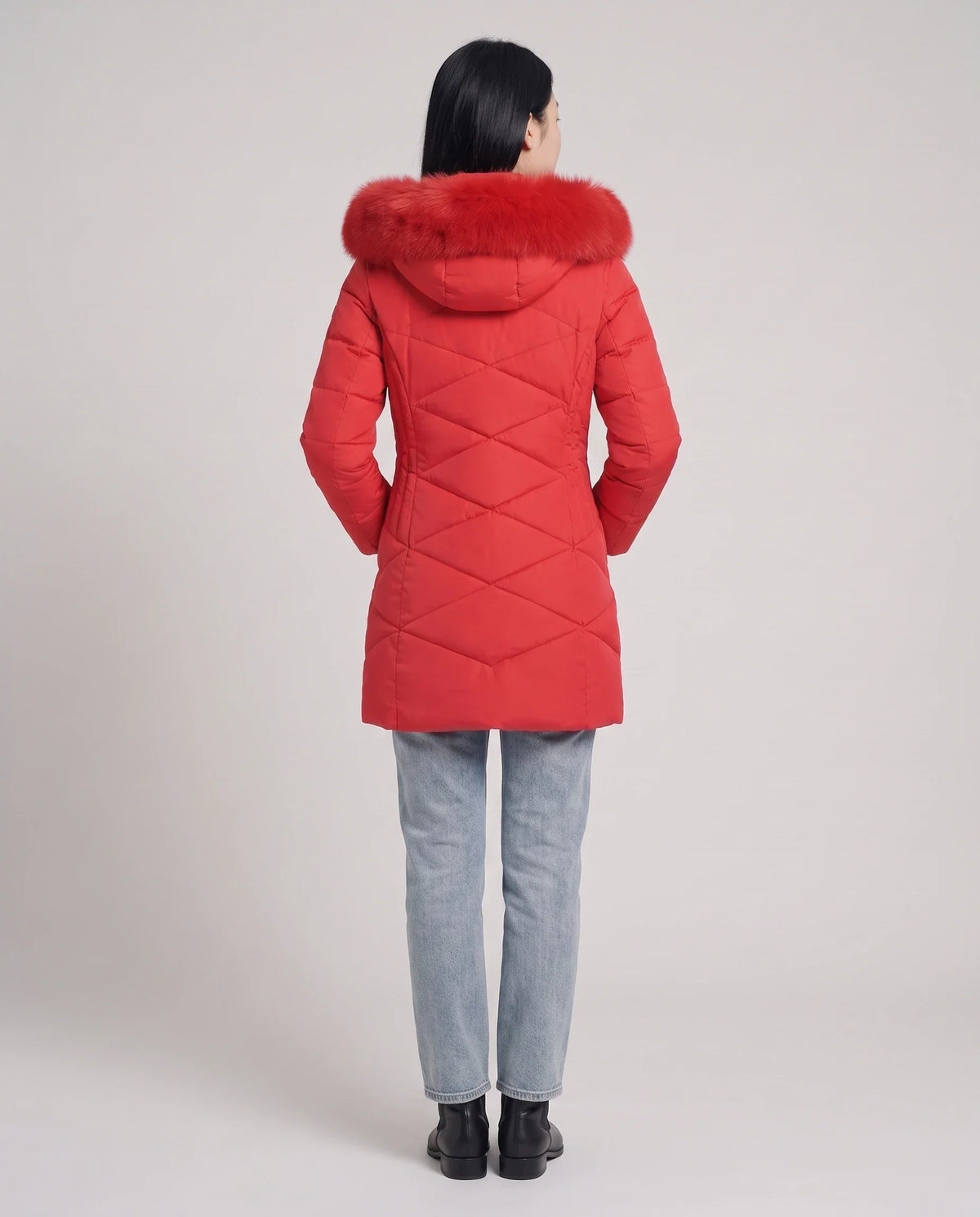 Parka mi-longue cintrée à capuche fourrure