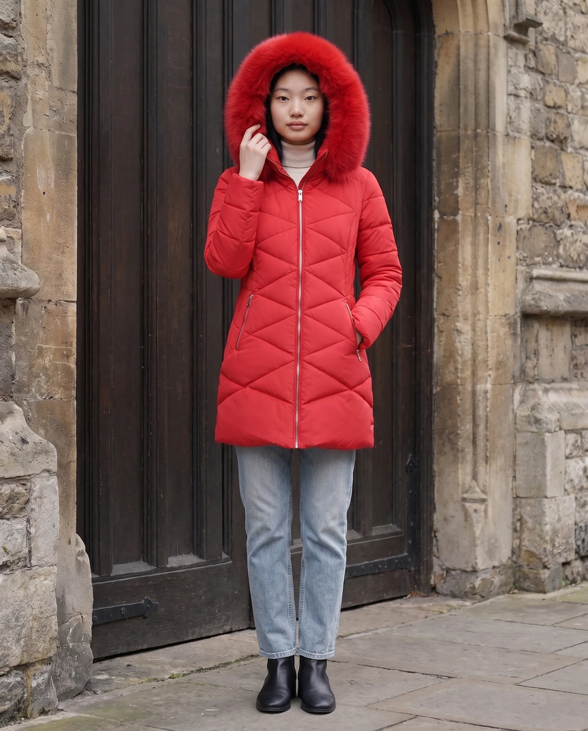 Parka mi-longue cintrée à capuche fourrure
