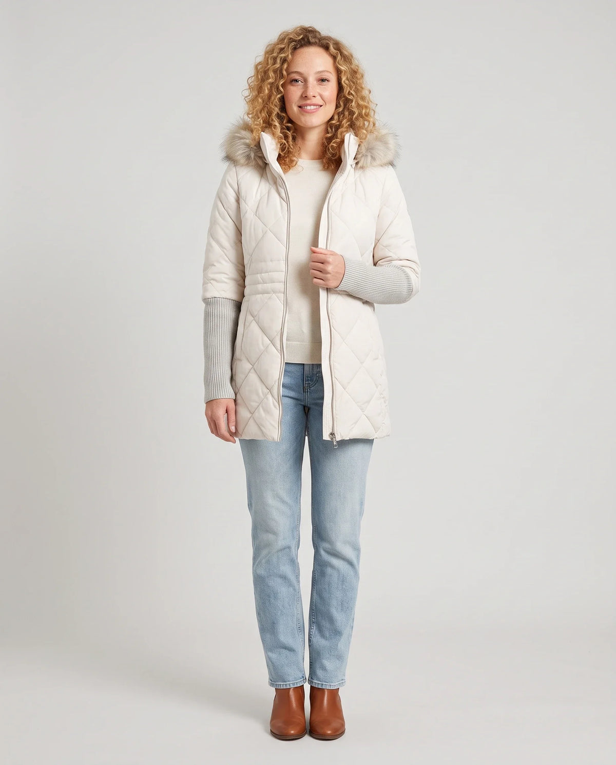 Parka mi-longue matelassée à manches tricot
