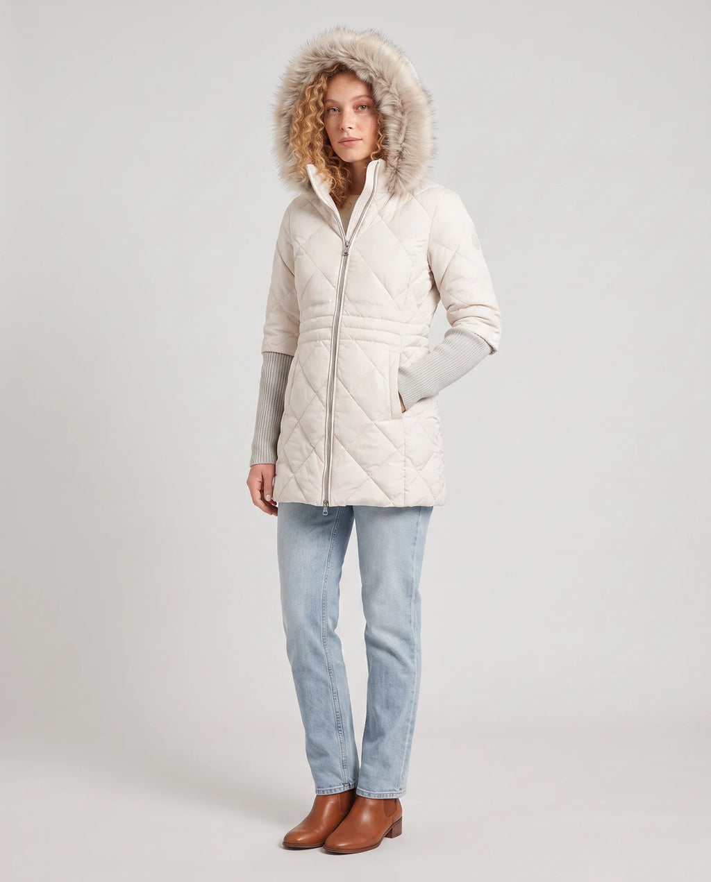Parka mi-longue matelassée à manches tricot