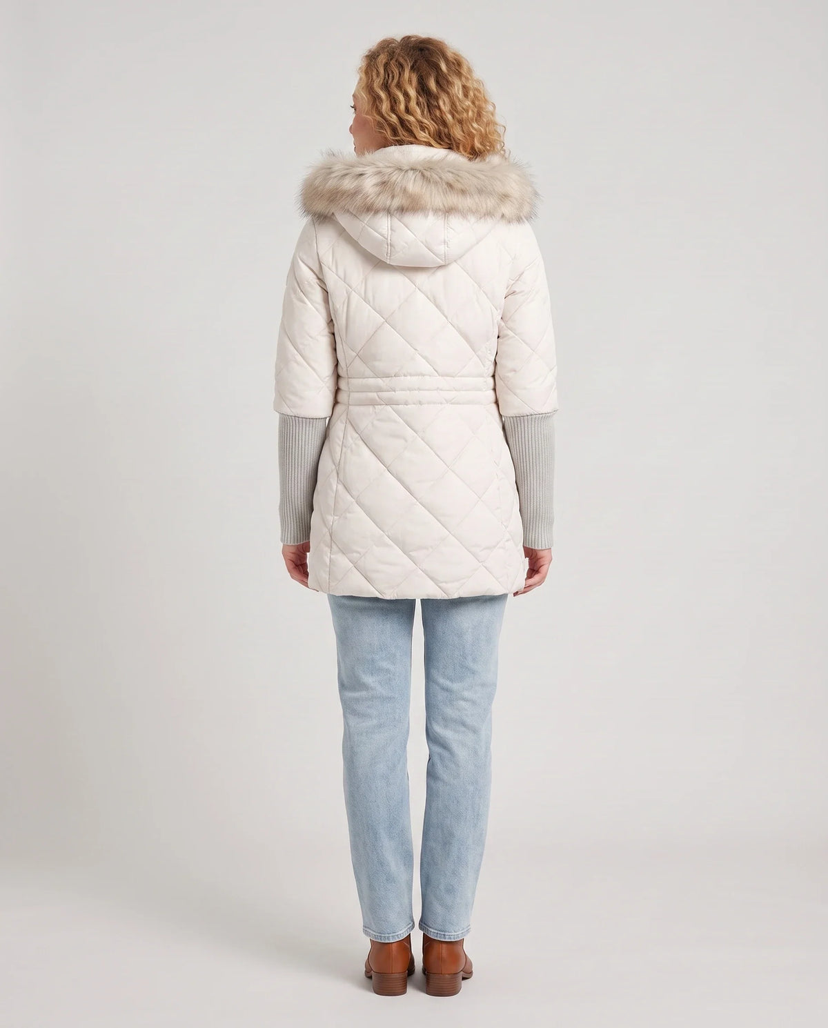 Parka mi-longue matelassée à manches tricot