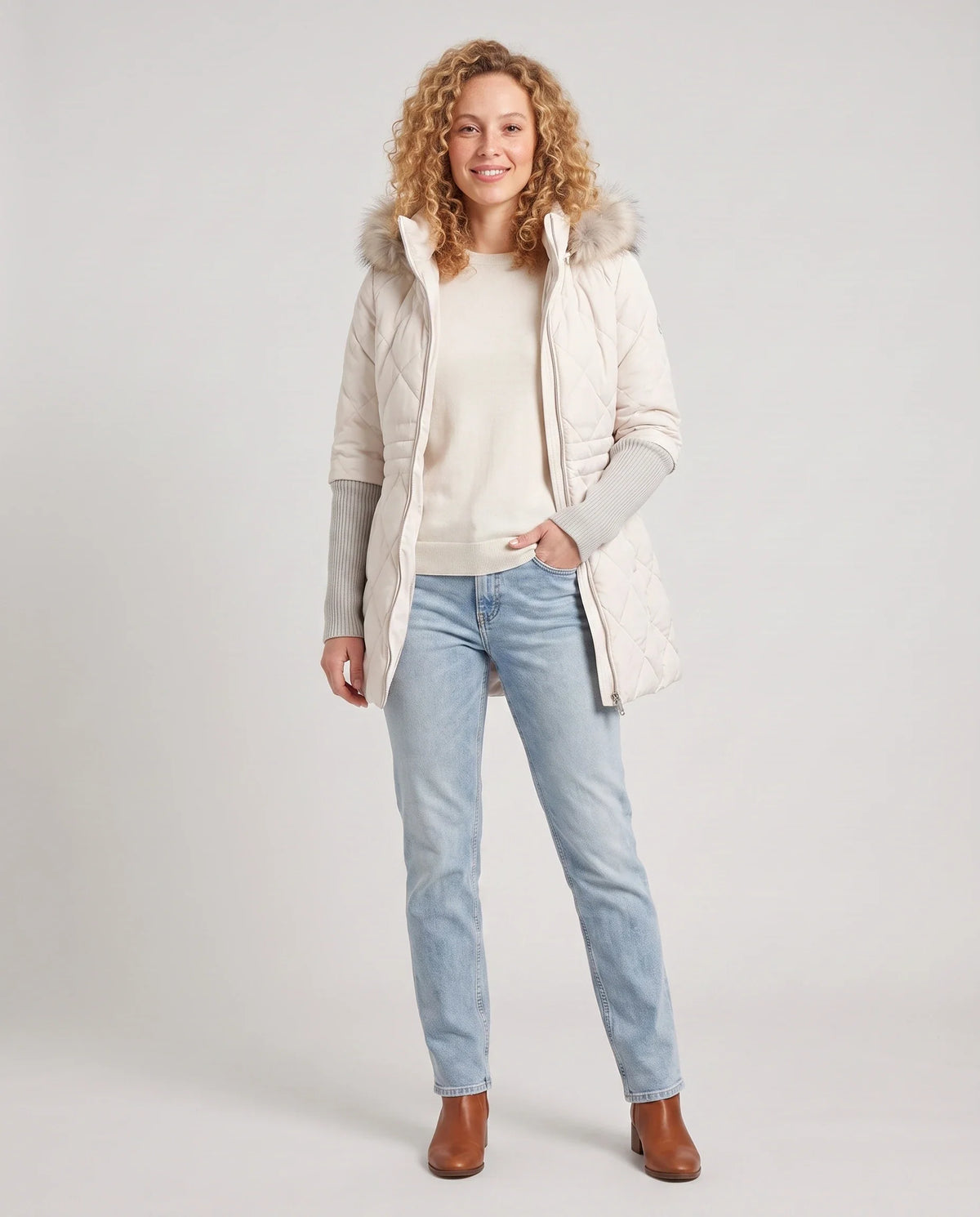Parka mi-longue matelassée à manches tricot