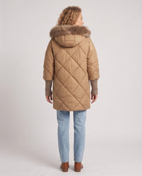 Parka mi-longue matelassée à manches tricot