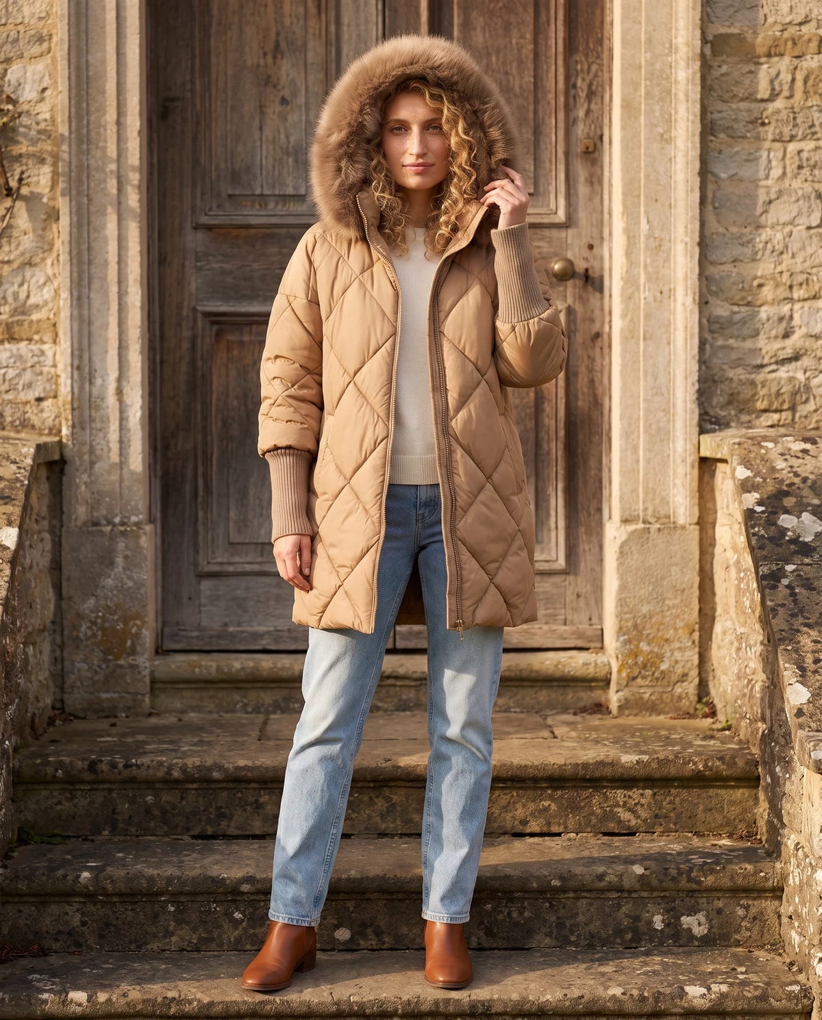 Parka mi-longue matelassée à manches tricot