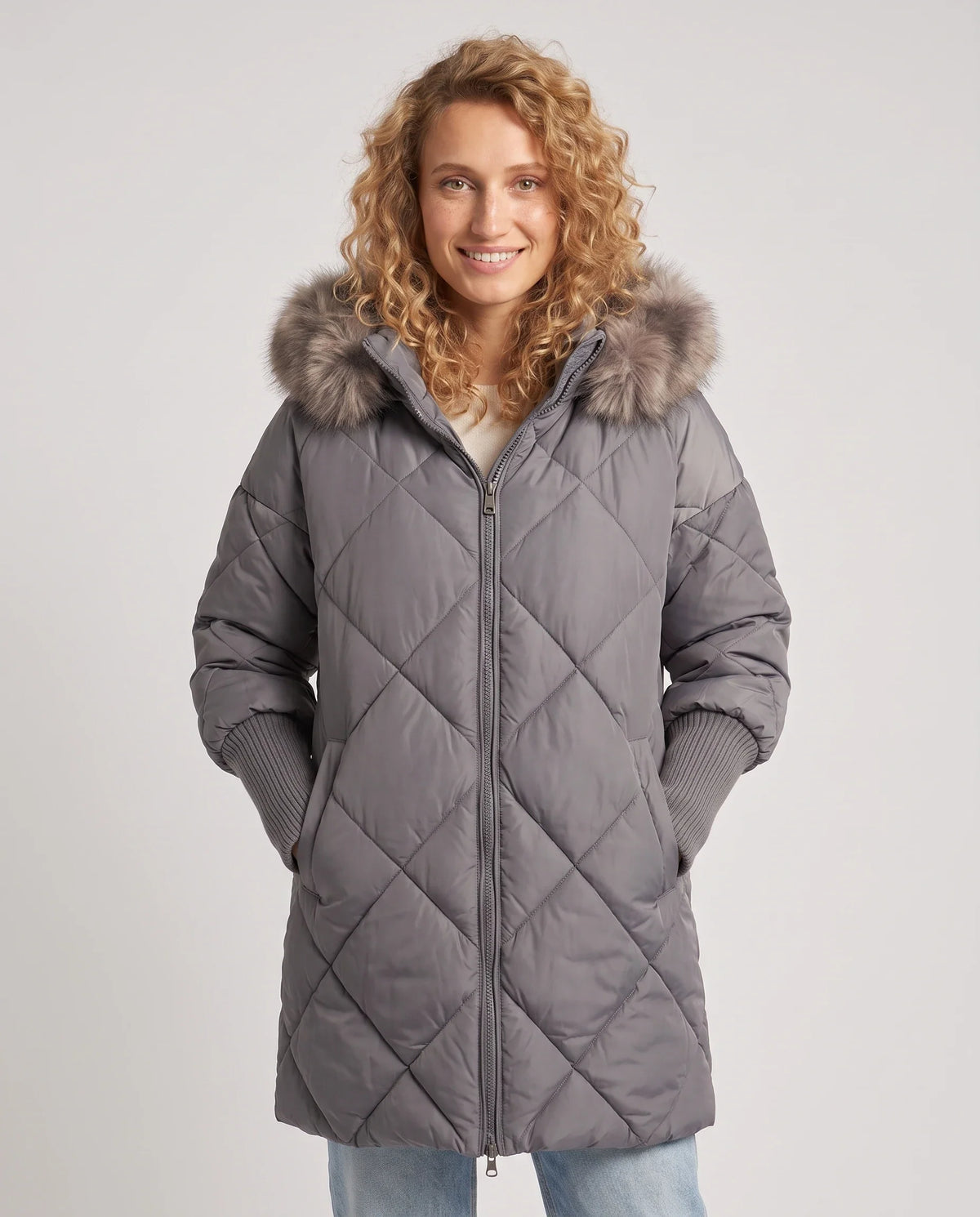 Parka mi-longue matelassée à manches tricot