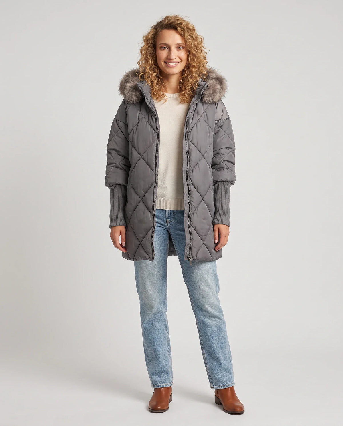 Parka mi-longue matelassée à manches tricot