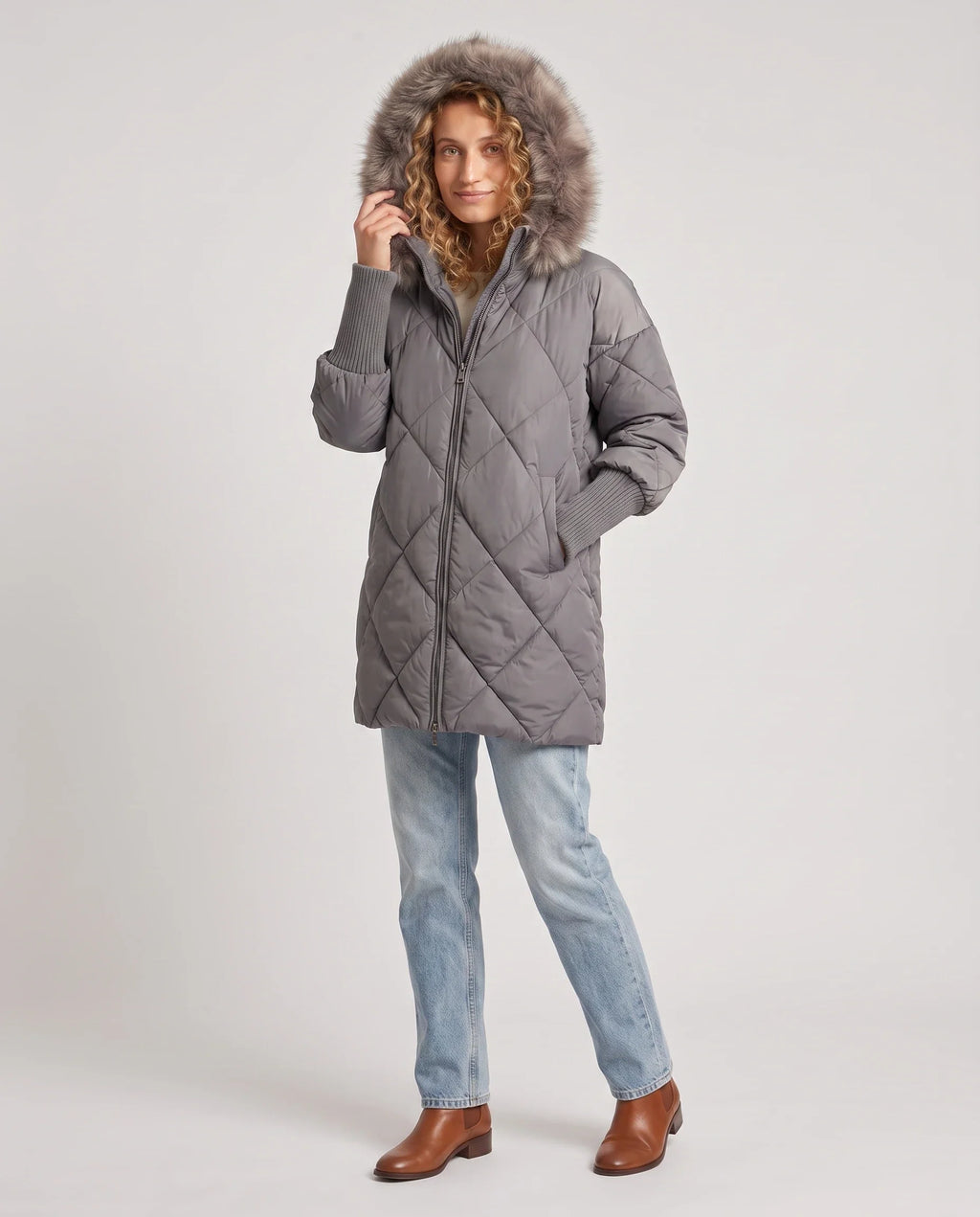 Parka mi-longue matelassée à manches tricot