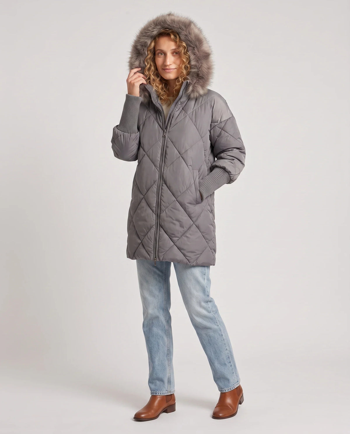 Parka mi-longue matelassée à manches tricot
