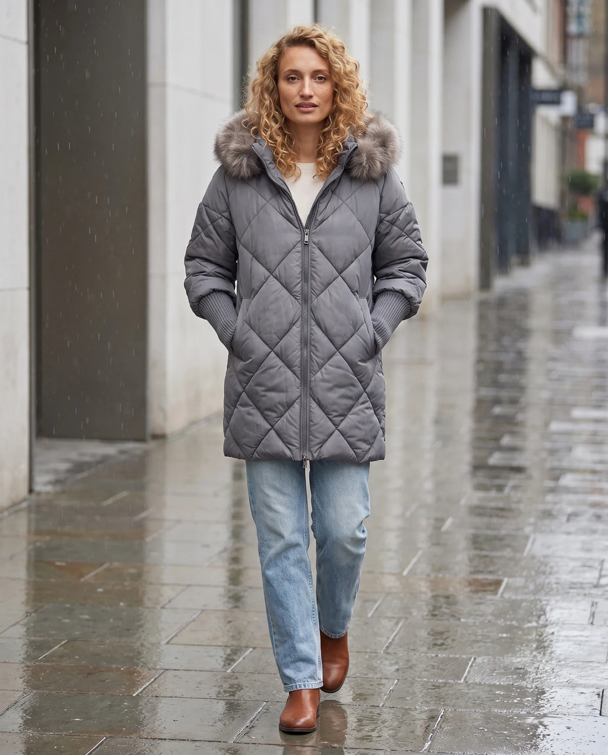 Parka mi-longue matelassée à manches tricot