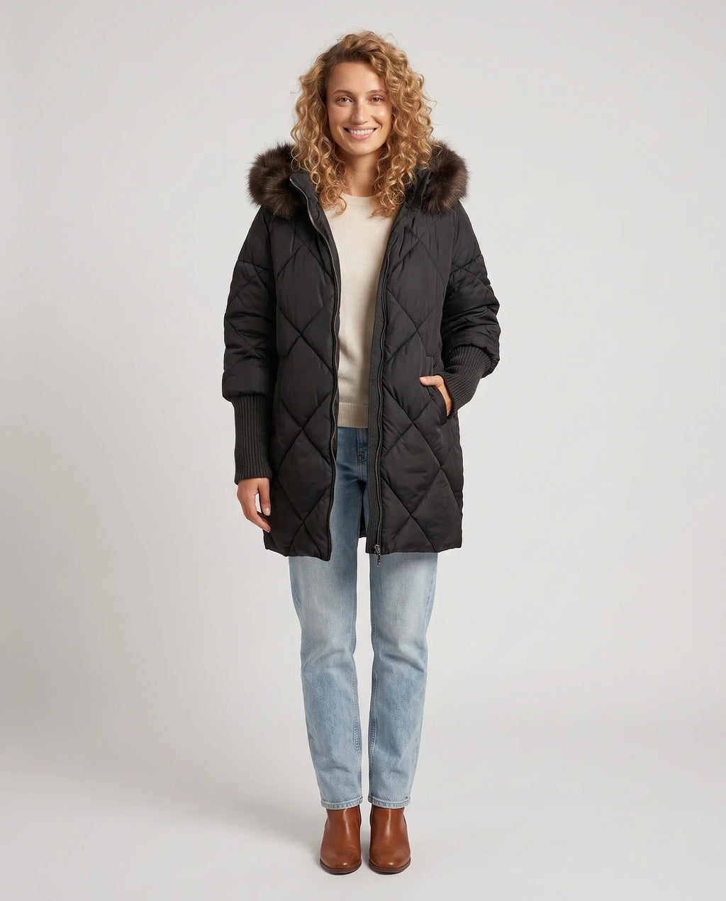 Parka mi-longue matelassée à manches tricot