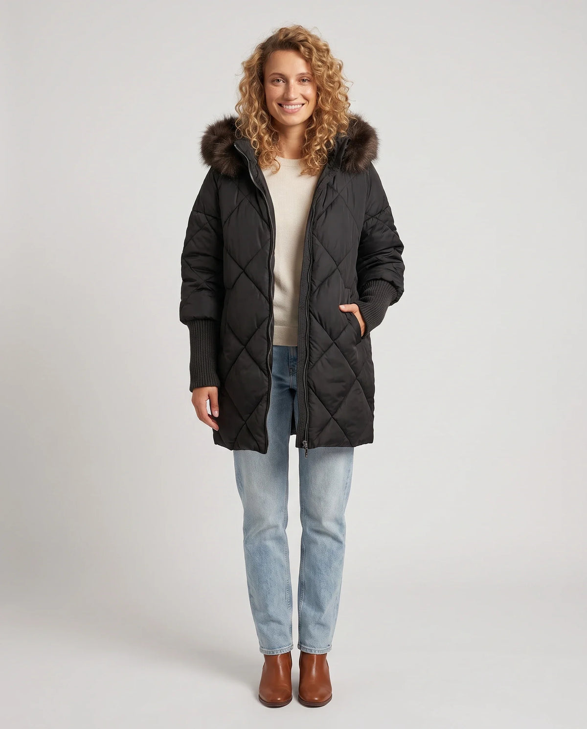 Parka mi-longue matelassée à manches tricot