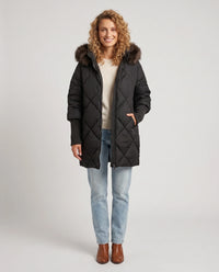 Parka mi-longue matelassée à manches tricot