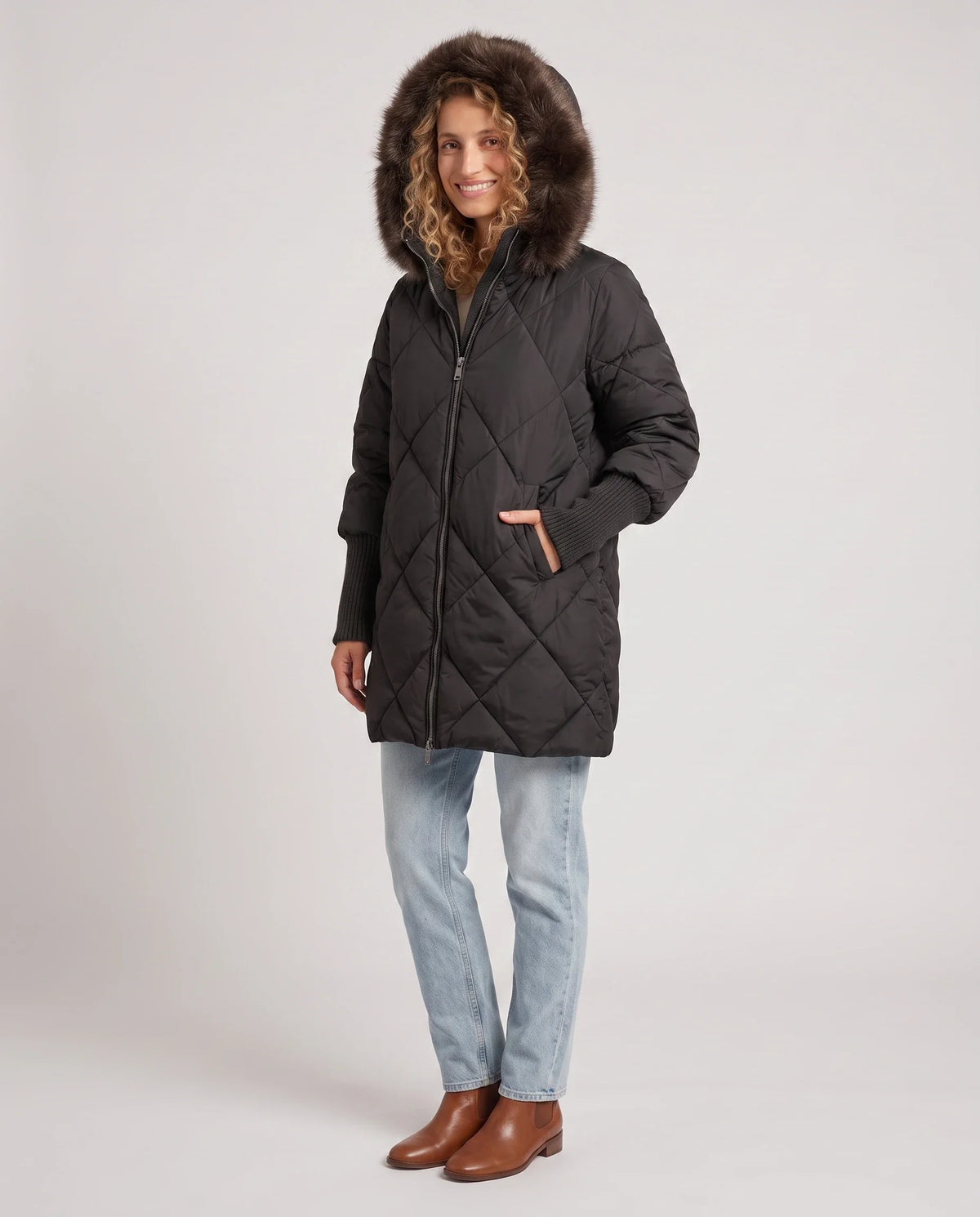 Parka mi-longue matelassée à manches tricot