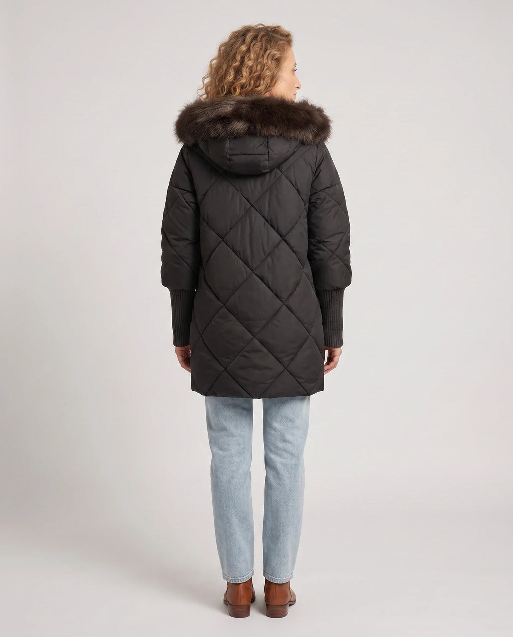 Parka mi-longue matelassée à manches tricot