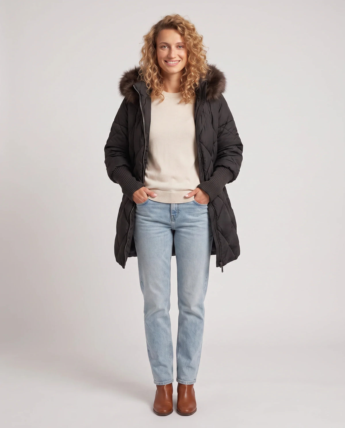 Parka mi-longue matelassée à manches tricot