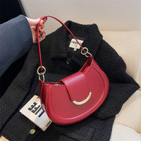 Petit sac bandoulière en simili cuir avec anse courte